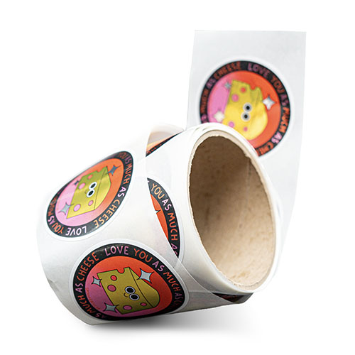 Roll of labels featuring a cartoon cheese with a smiley face and the text "Love you as much as cheese" on a circular black border.